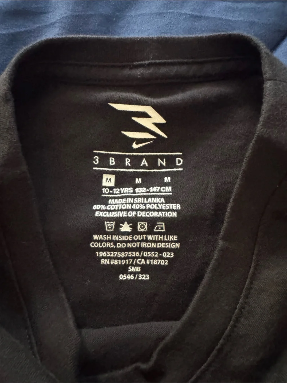 Nike Youth Black Long Sleeve Shirt with Gold Lettering